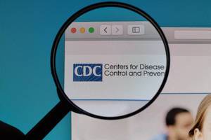 Centers for Disease Control and Prevention logo under magnifying glass
