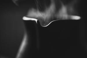 Ceramic Tepot Closeup And Hot Tea Smoke