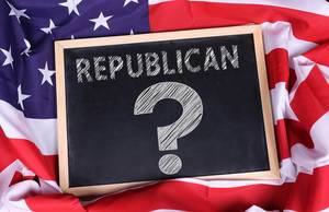 Chalkboard with Republican? text on American flag.jpg