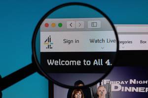 Channel 4 logo under magnifying glass