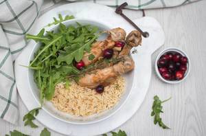 chicken Drumsticks with Rice and Arugula Top View