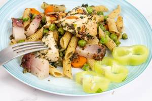 Chicken meat with Bacon and vegetables and pasta