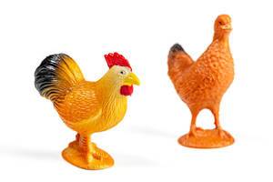 Chickens plastic toys for kids on white background