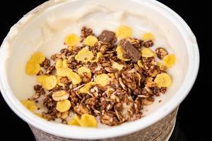 Chocolate mousli with corn flakes in the bowl (Flip 2019)