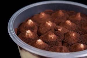 Chocolate souffle in the plastic bowl