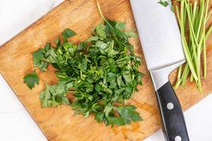 Chopped Parsley on the wooden board