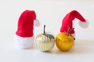 Christmas hats and apples