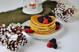 Christmas pancakes with with mix of berries