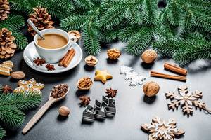 Christmas Themed Photo with a Cup of Coffee, Cookies and Walnuts