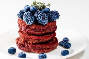 Close-up, beetroot pancakes with blueberries and mulberries (Flip 2019)