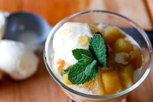 Close Up Food Photo of Glass with Vanilla Ice Cream, Apple Mush and Spearmint