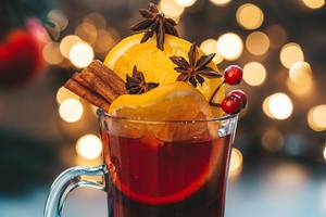 Close-up glass of mulled wine on a Christmas background (Flip 2019)