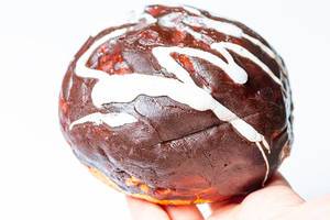 Close-up of a doughnut with dark and white chocolate (Flip 2020)