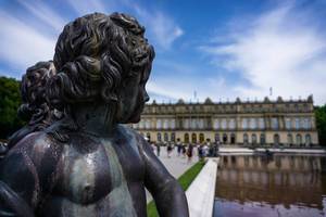 Close Up of Child Statue - Castle Herrenchiemsee in background