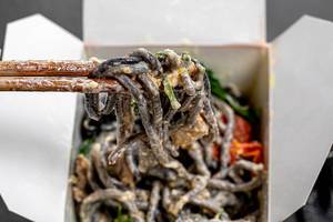 Close up of Chinese noodles with cuttlefish ink