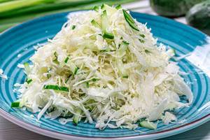 Close-up of fresh cabbage and cucumber salad