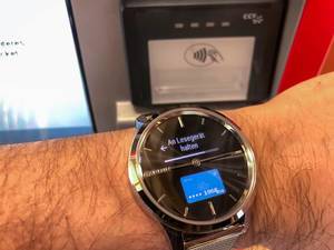 Close-up of Garmin smartwatch used for contactless payment via the Garmin Pay system