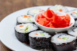 Close-up of homemade sushi rolls with pickled ginger