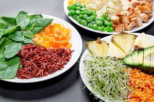 Close up of three plates of healthy food