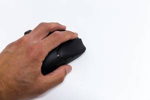 Close-up on a white background of a hand of a man using the Viper Ultimate wireless gaming mouse by Razer
