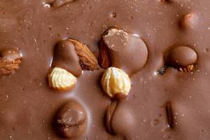 Close Up Photo of Milk Chocolate with Hazelnuts and Almonds