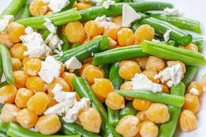 Close-up salad with chickpeas, asparagus and feta cheese (Flip 2019)