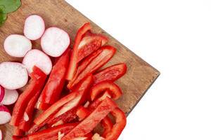 Closeup image of Chopped red Paprika and Radishes (Flip 2019)