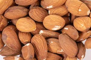 Closeup macro of Raw Almonds (Flip 2019)