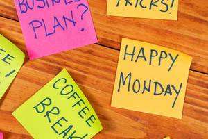 Coffee Break and Happy Monday sign on the reminder papers