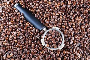 Coffee maker sump, coffee beans background (Flip 2019)
