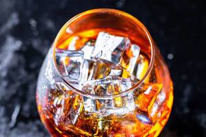 Cognac with ice cubes
