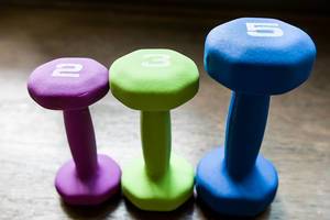 Colored dumbbells with different weights for home workout