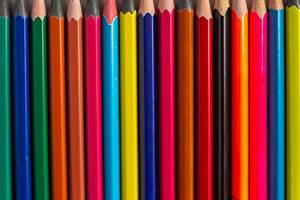 Colored pencils in a row