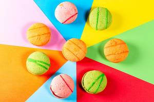 Colorful macaroon on a colored paper