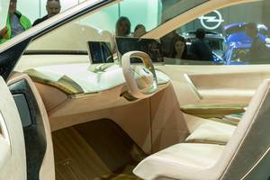 Comfortable Interior design, steering wheel and displays in the electric SUV BMW Vision iNext