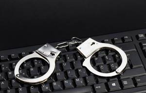 Computer keyboard and handcuffs
