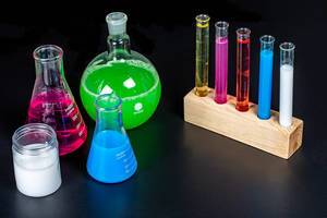 Concept pharmacy and chemistry. Test glass flasks with solutions in research laboratory (Flip 2020)