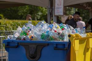 Container filled with collected empty PET bottles, cans and plastic cups at Tomorrowland Festival 2019