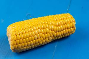Cooked Young Corn on the blue boards (Flip 2019)