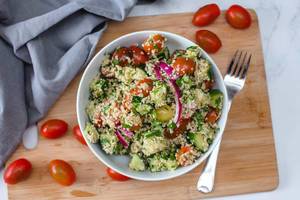 Couscous Salad With Vegetables in a White Bowl