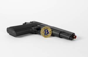Cryptocurrency and handgun