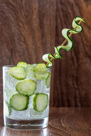 Cucumber cold drink with slices of fresh cucumber