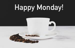 Cup of coffee with Happy Monday! text