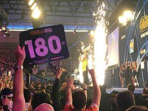 Darts world championship william hill 180 signs and the champion on stage in the background