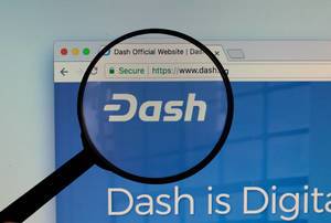 Dash logo on a computer screen with a magnifying glass
