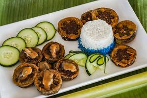 Deep fried eggplants with mussel toppings