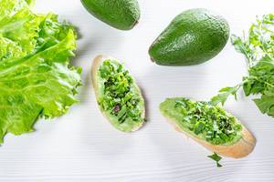 Delicious and healthy food with green sandwiches, avocado and lettuce
