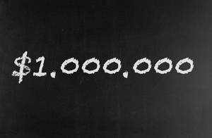 Die Zahl eine Million US-Dollar in weiß auf dunklem Hintergrund