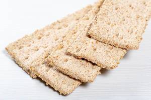 Dietary bread made from wheat germ on white background