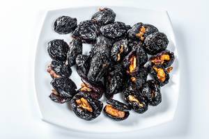 Dietary healthy dessert without sugar-prunes with walnuts inside